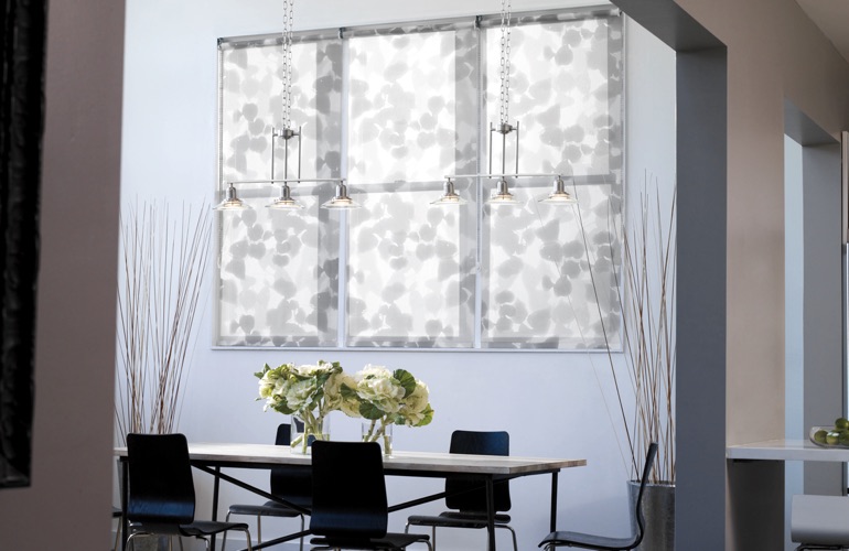 Patterned gray shades in contemporary dining room
